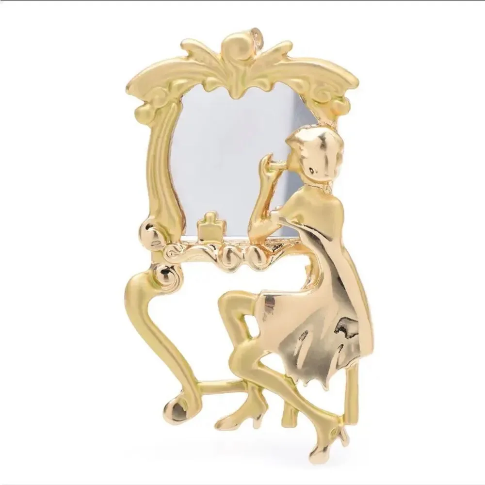 REFLECTION IN MIRROR BROOCH‎